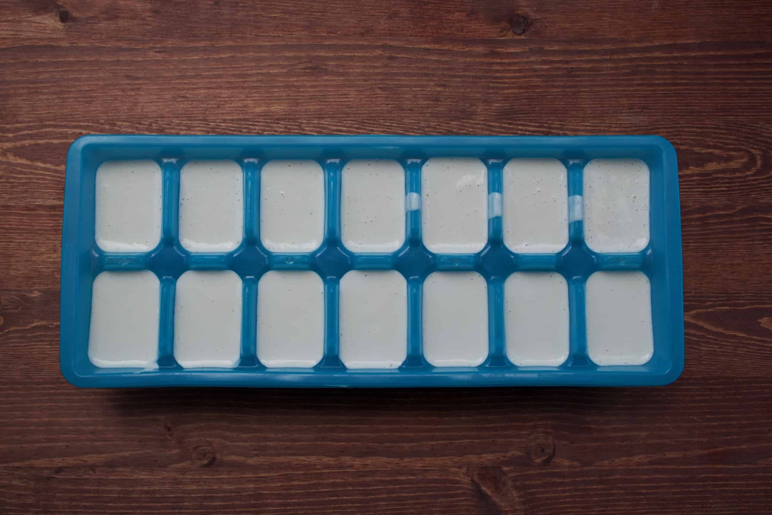 cashew cream in an ice cube tray