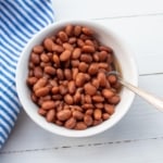 cooked pinto beans in aa bowl