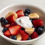fruit salad with strawberries, blueberries, and banana