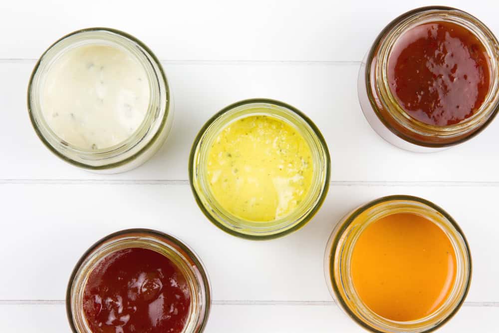 5 different sauces in small jars